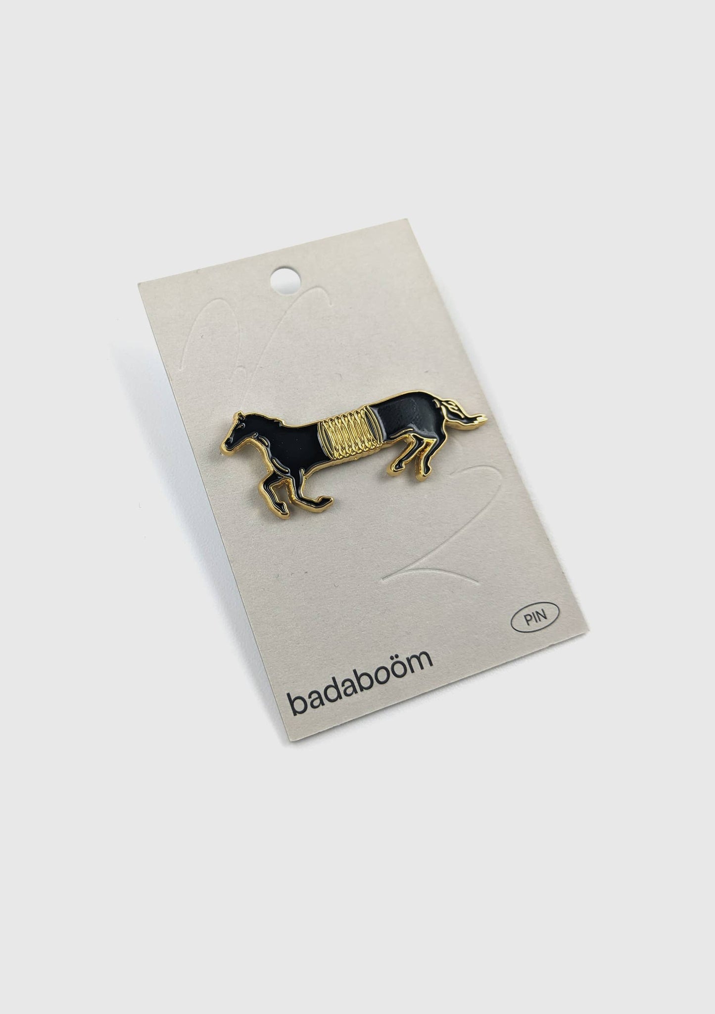 Back view of Spring Horse enamel pin showing rubber clutch pin backing - PABOOM
