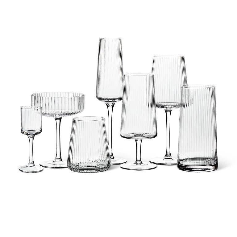 Clear glass cocktail coupe with fine optic ribbing, additional angle