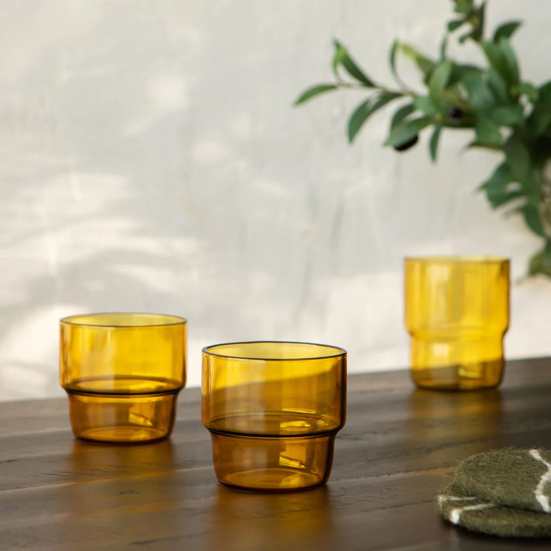 Amber Stackable Tumbler shown nested with a second glass to demonstrate the stacking design - PABOOM