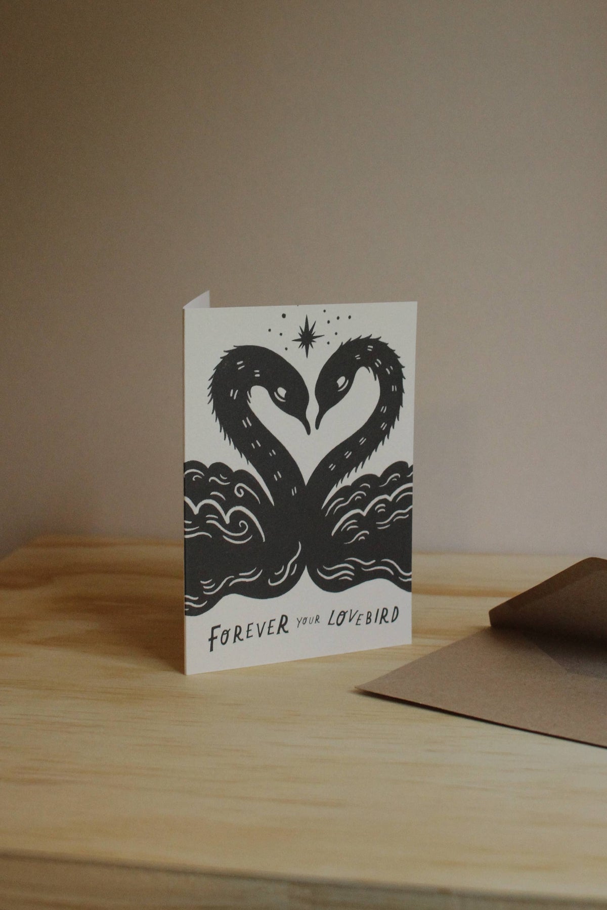Close-up of the swan illustration detail on the 'Lovebirds' card