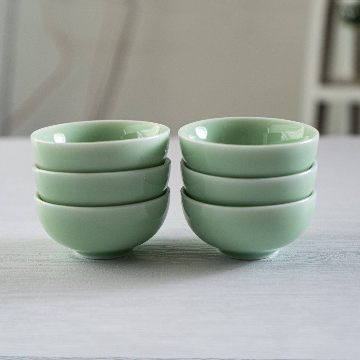 Sculpted koi fish inside green porcelain tea cup detail - PABOOM