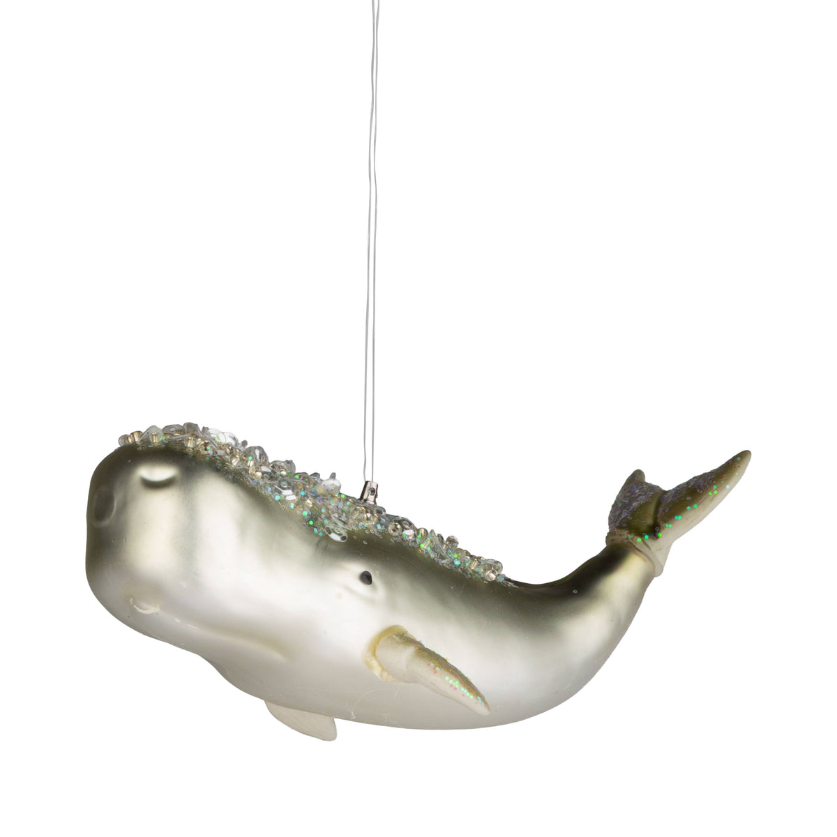 Pale gold glass whale ornament with iridescent glitter detailing on its back - PABOOM