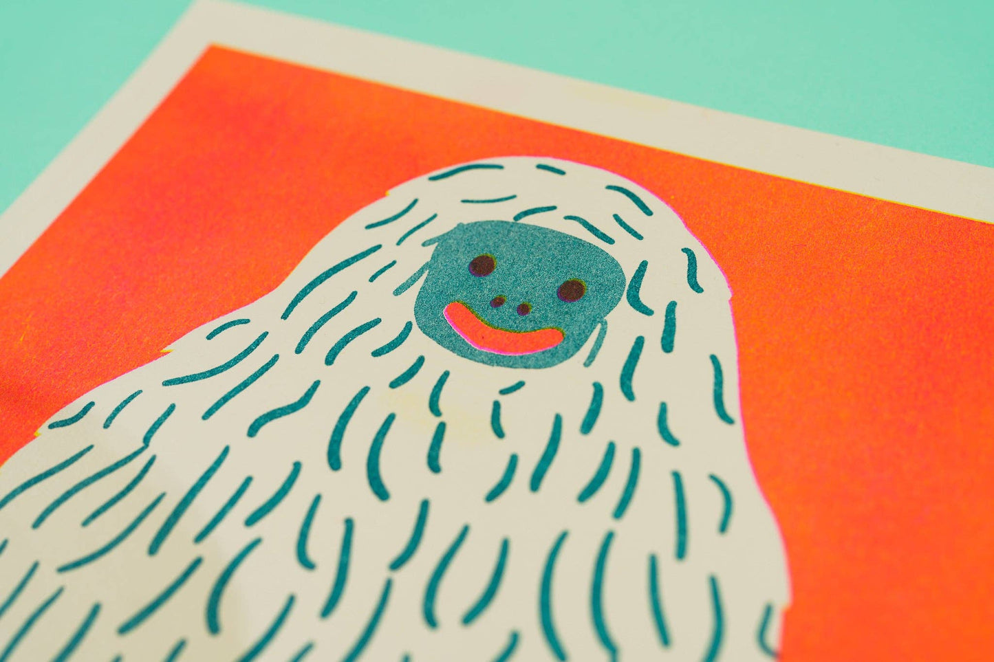 Yeti risograph print shown unframed on a table - PABOOM