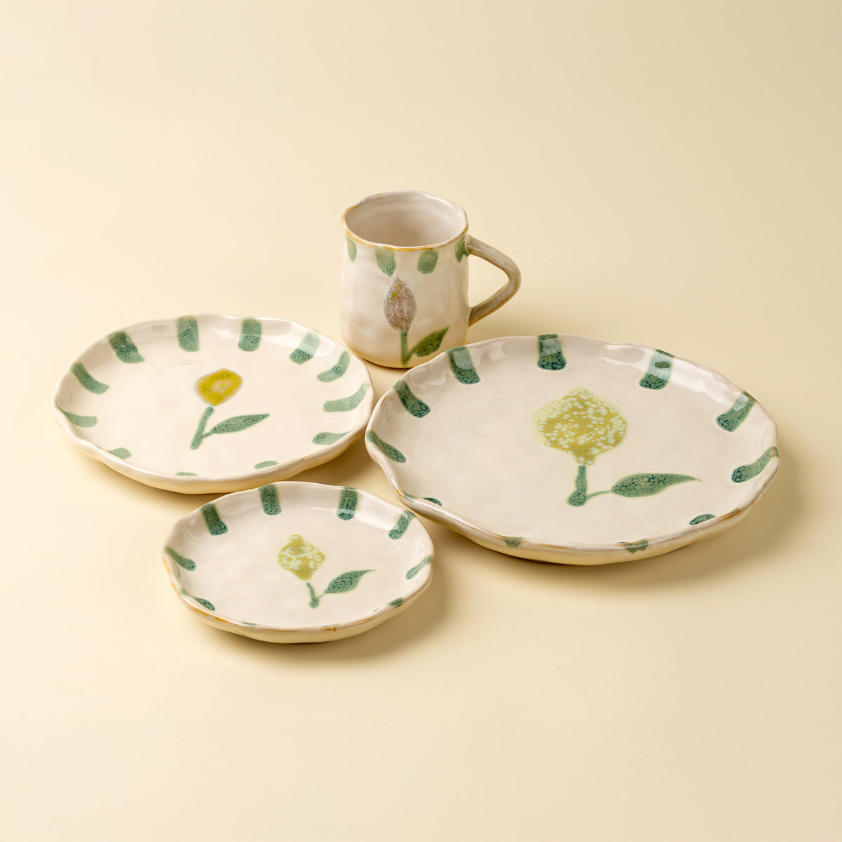 Painted Petals Plate in Lemon shown at an angle