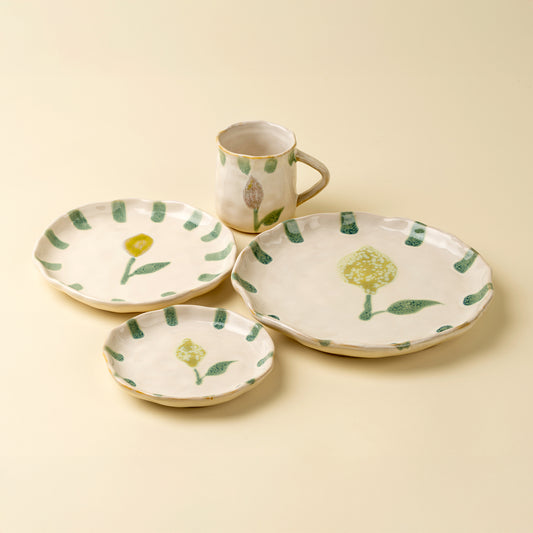 Painted Petals Plate in Lemon shown at an angle