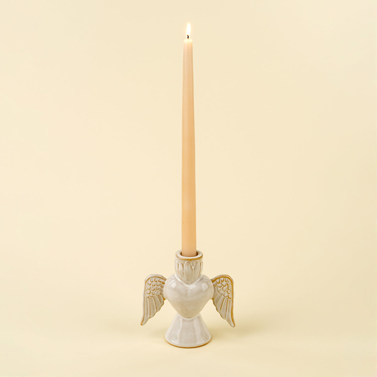 Angel Candle Holder shown from a side angle highlighting the wing detail