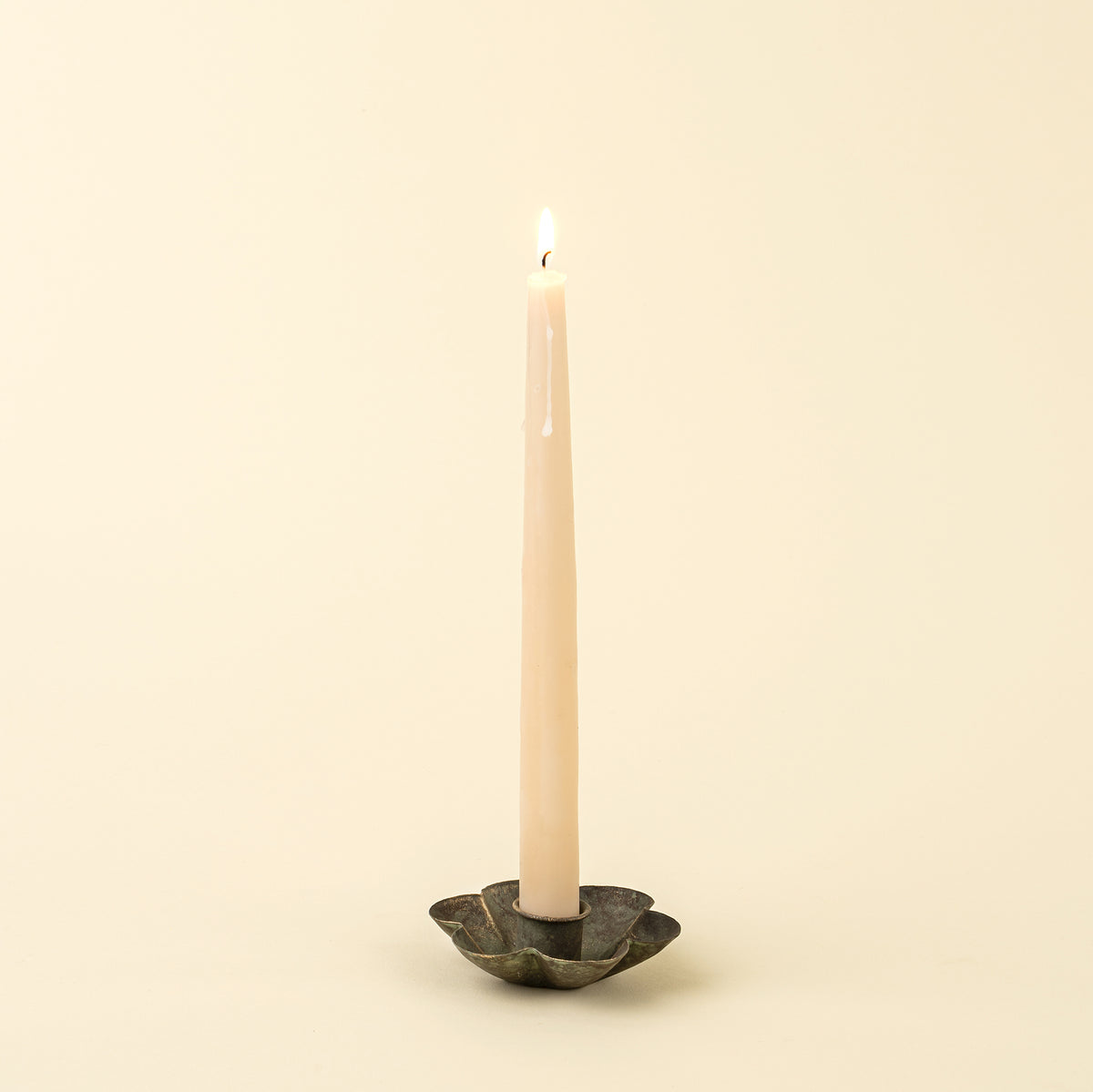Close-up of the green patina finish on the Florentine Candle Holder, Daisy