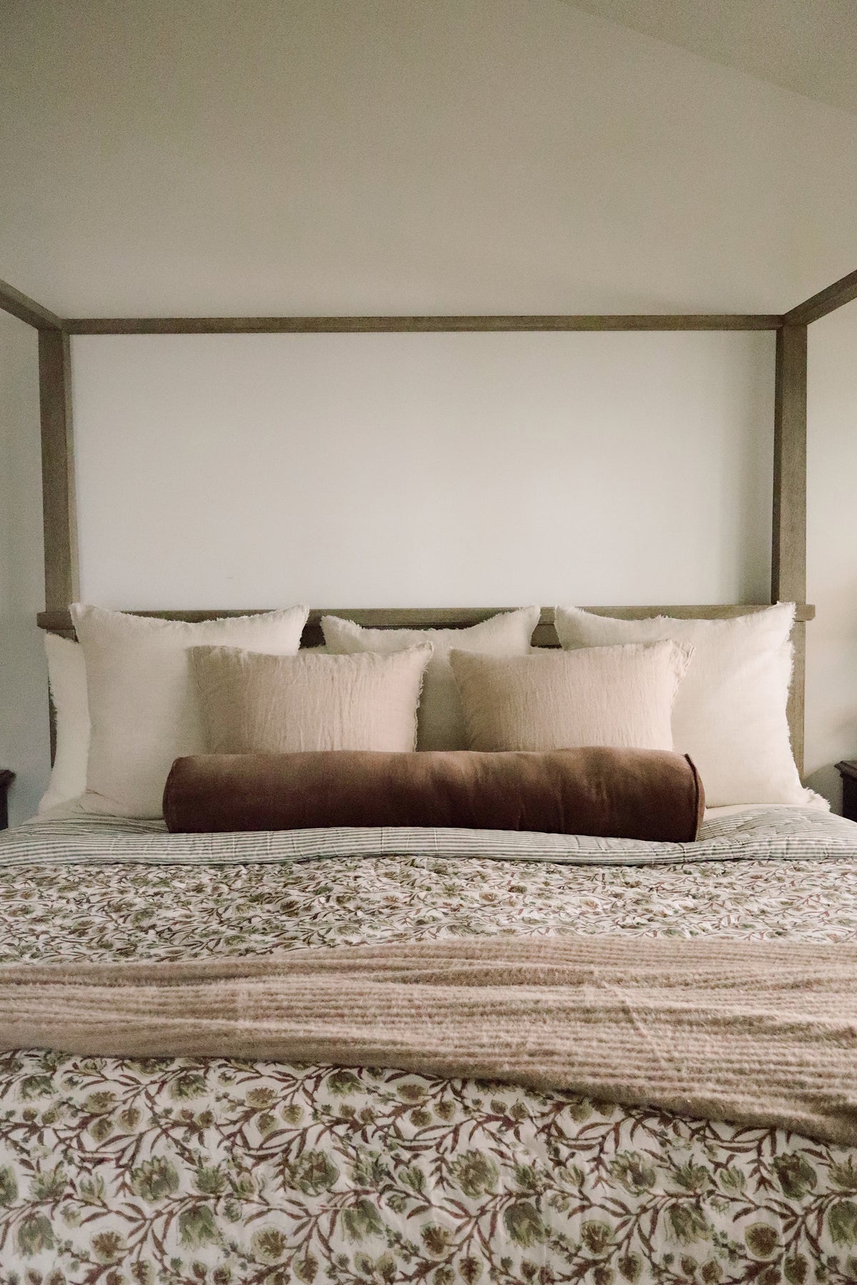 Close-up of the velvet texture on the Vera Velvet Long Bolster in Clove