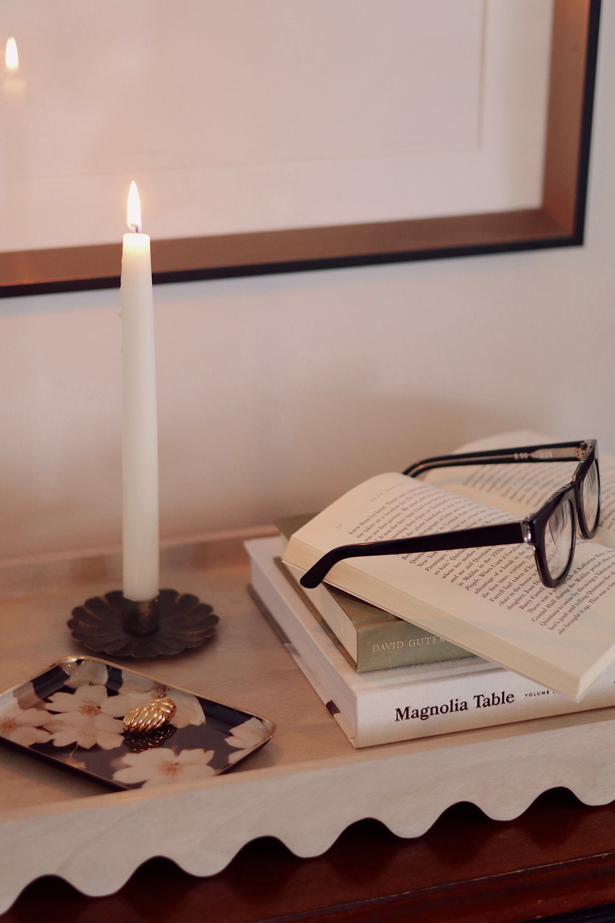 Midnight Cosmos Decorative Enameled Tray styled on a table holding small items