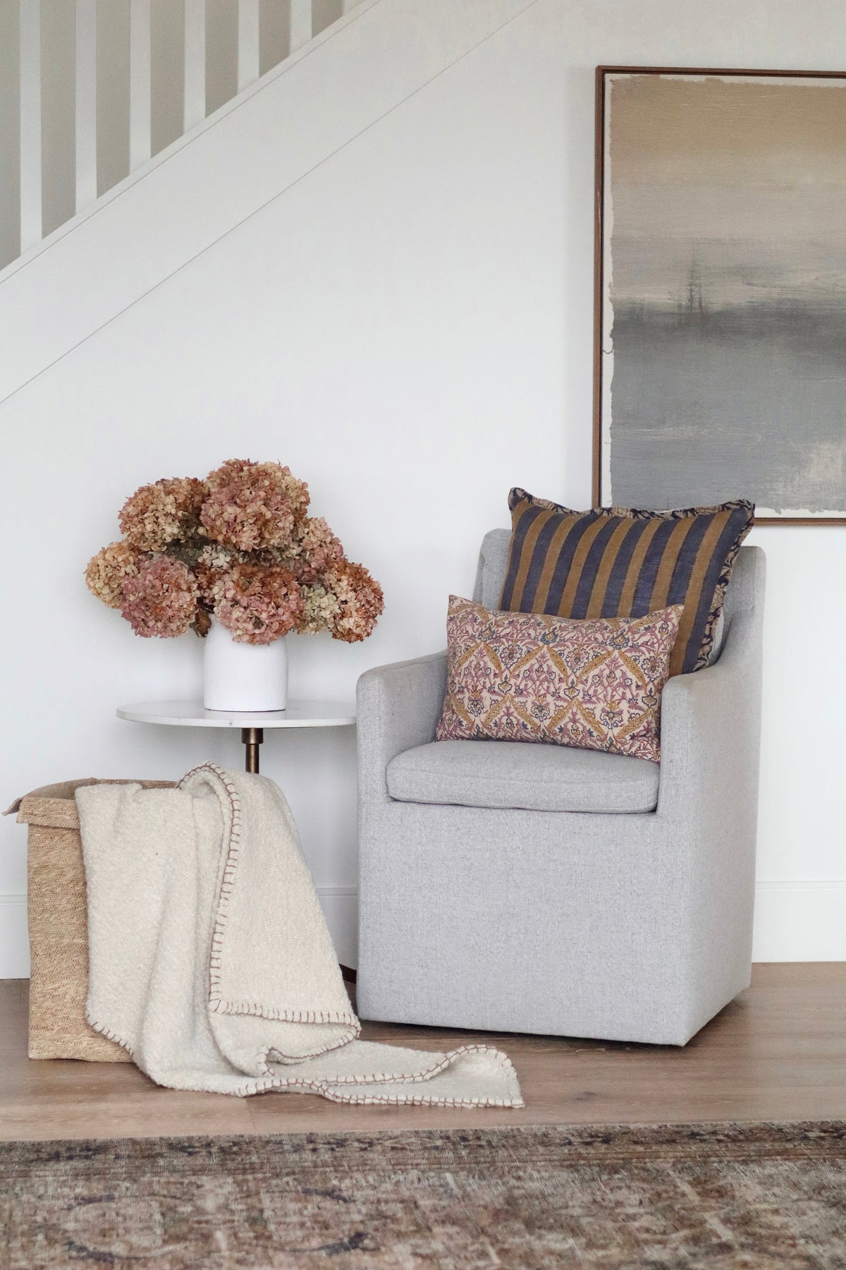 Luna Vine Block Print Pillow shown from a side angle showing its shape