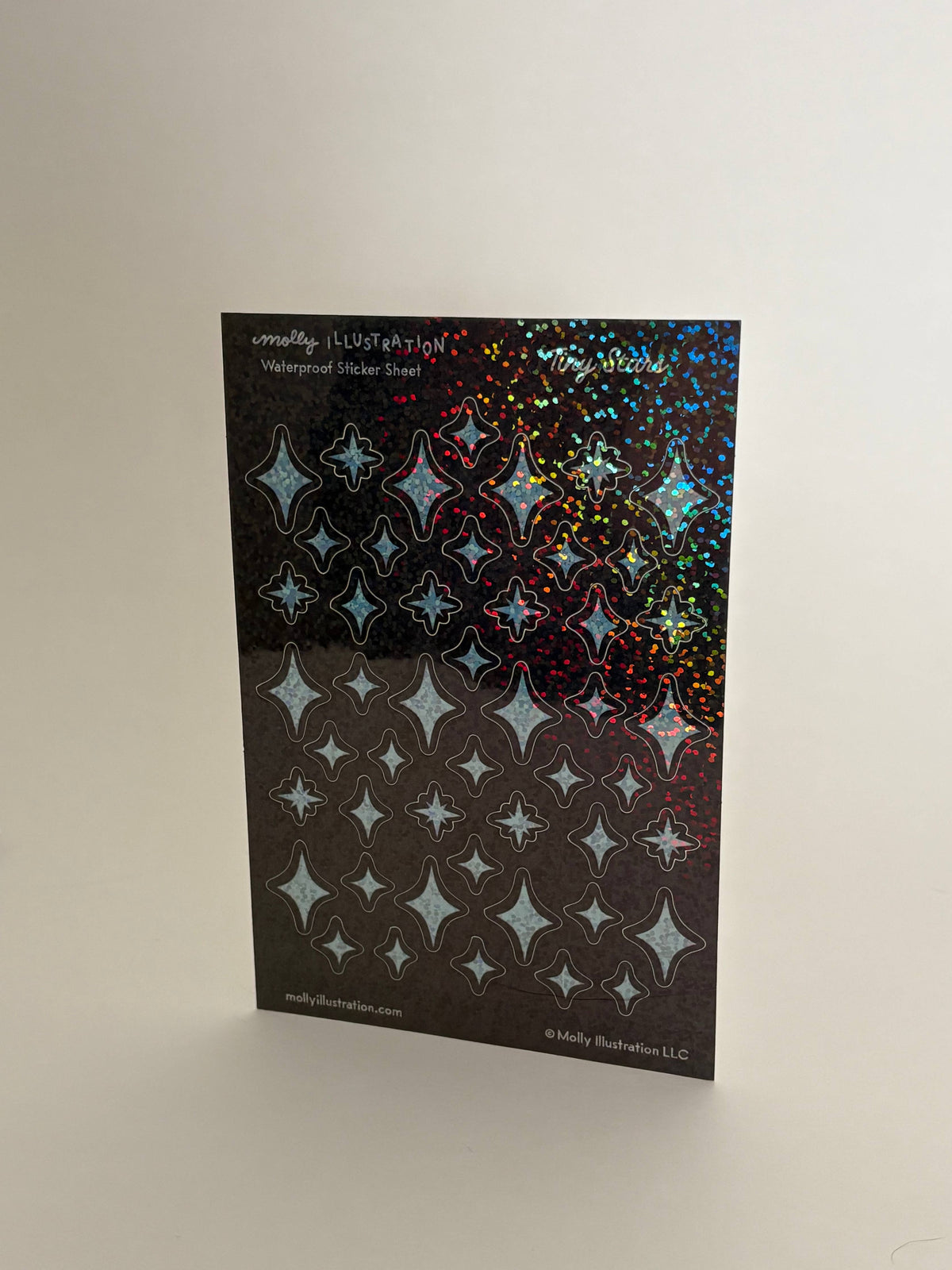 Close-up of the glossy glitter finish on the Tiny Stars sticker sheet