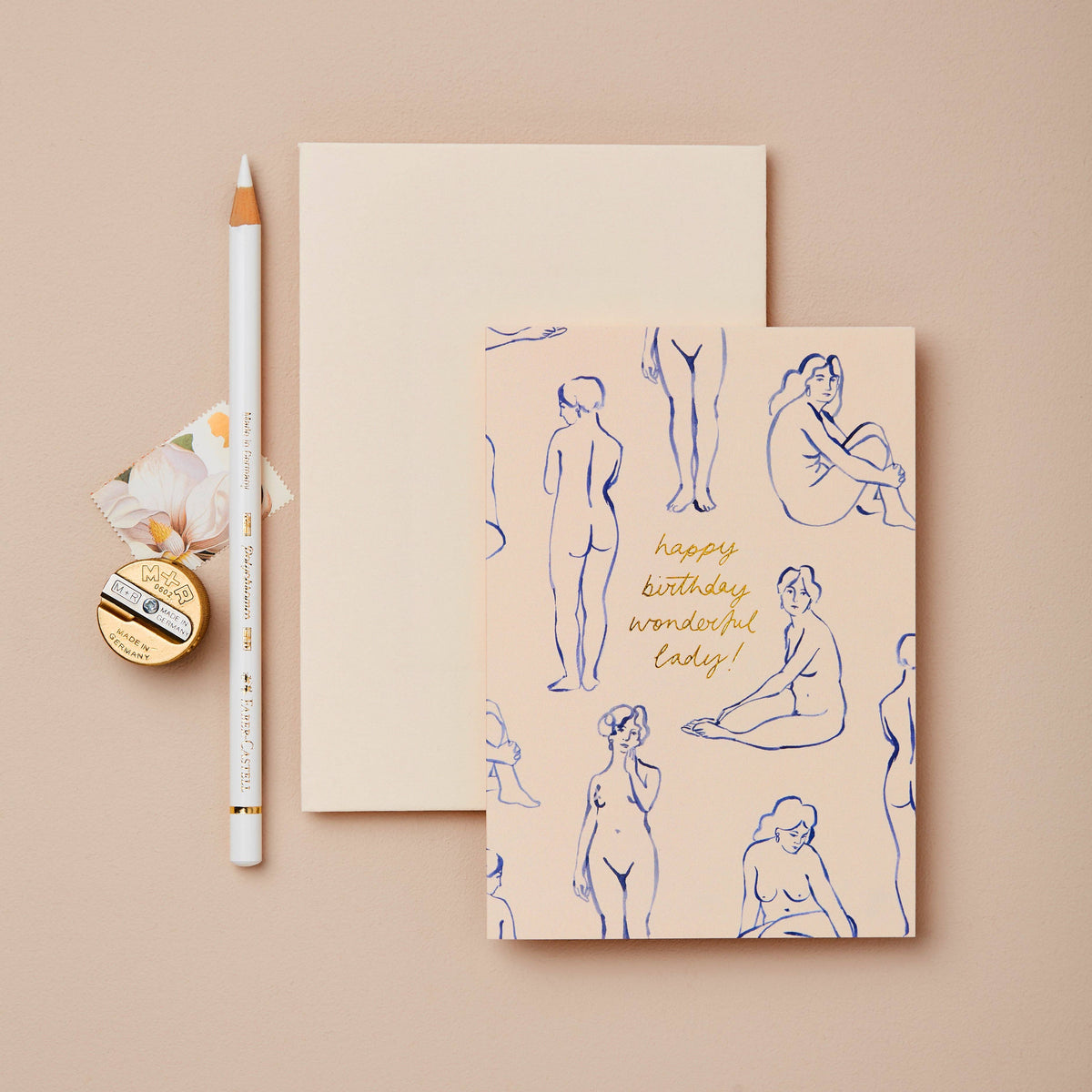 Blush pink card with navy blue line-art nude figures, reading Happy Birthday Wonderful Lady!