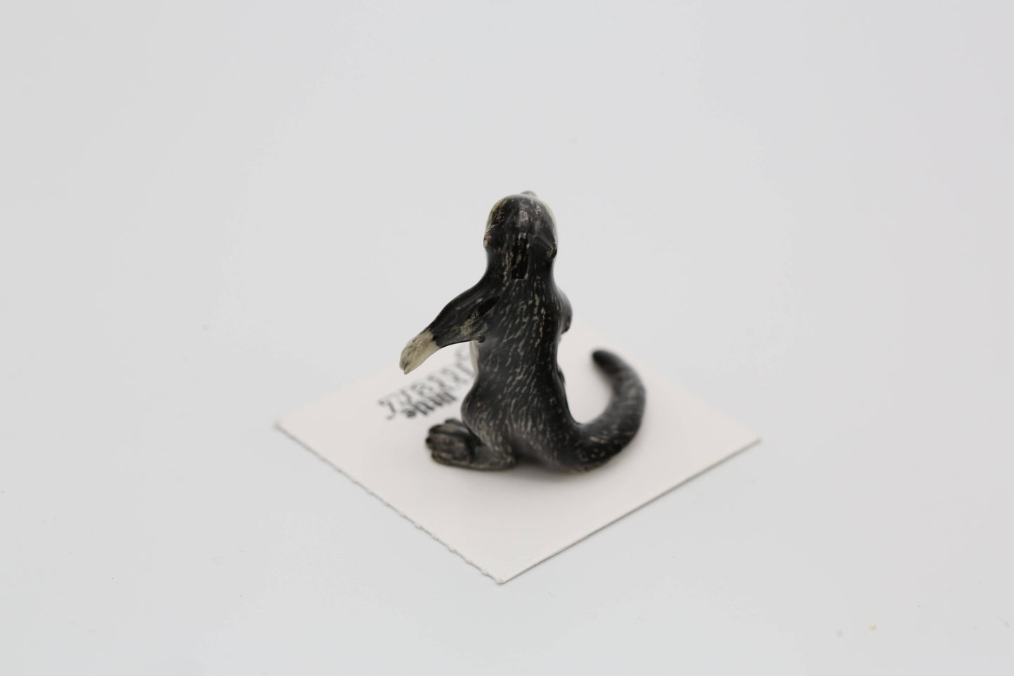 Slide River Otter Decorative Figurine in Porcelain Miniature