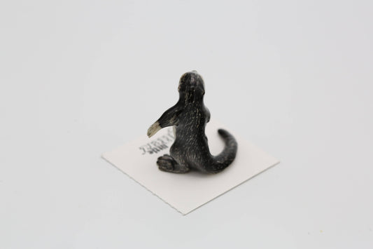 Slide River Otter Decorative Figurine in Porcelain Miniature