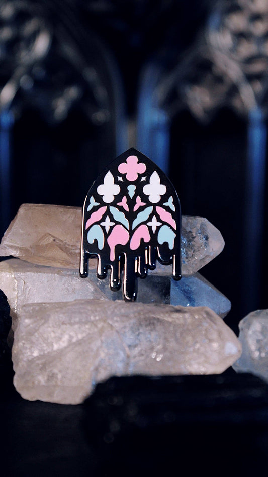 Close-up of the enamel detailing on the Trans Gothic Cathedral Window pin
