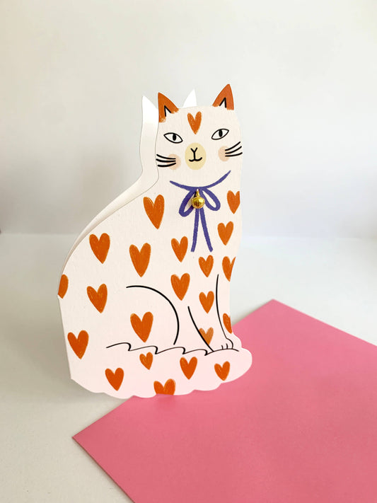 Sitting Kitty Shaped Greeting Card Loveheart shown at an angle highlighting the heart-print pattern