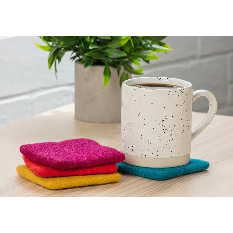 Felted wool coasters in use with ceramic mug – colourful, handcrafted, fair trade decor - PABOOM
