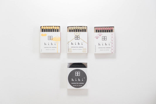 Hibi Yuzu incense match lit with fragrant smoke - PABOOM