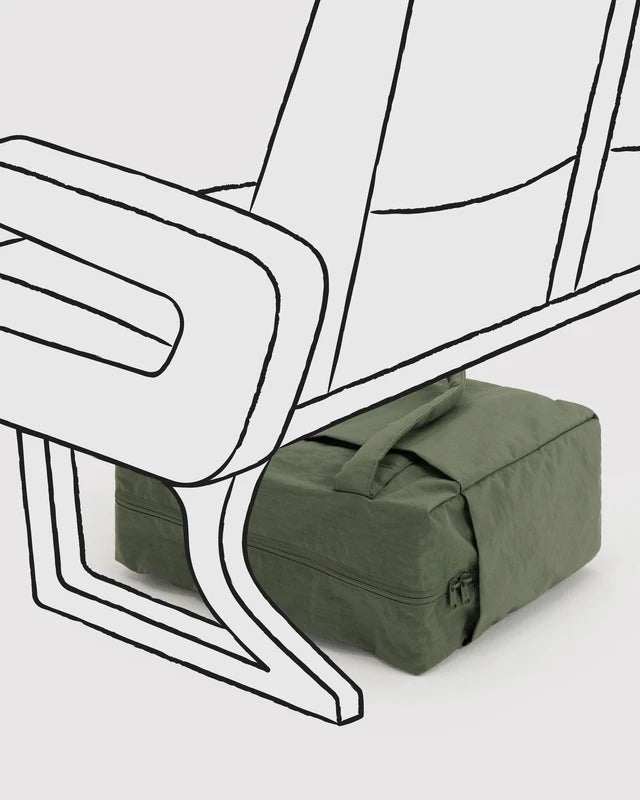 Close-up of the tech pocket and side pockets on the BAGGU Small Cloud Carry-On in caper green