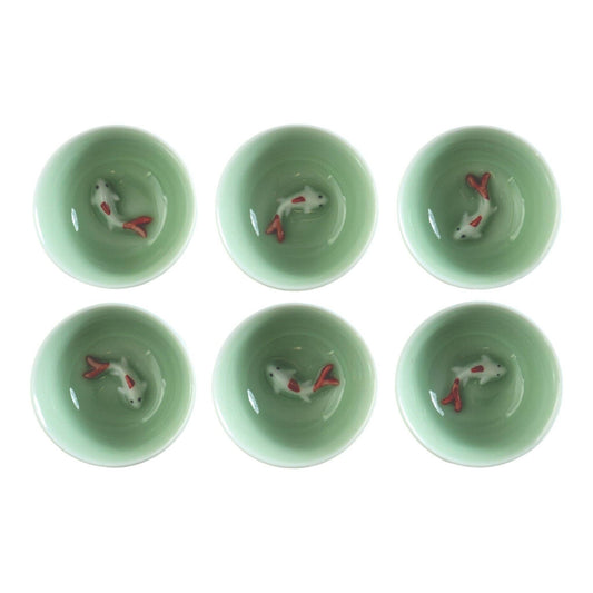 Koi fish tea cup filled with tea - PABOOM