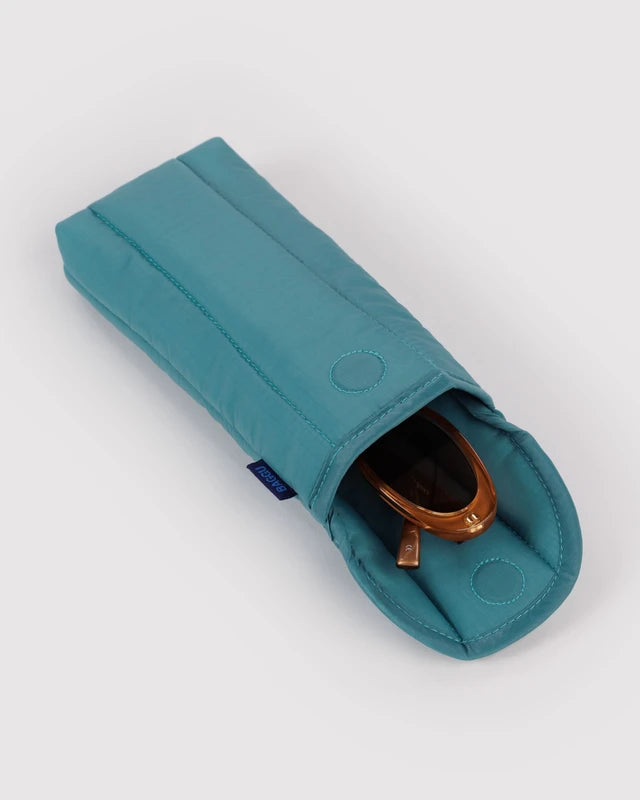 BAGGU Puffy Glasses Sleeve in peacock blue shown open to reveal the interior