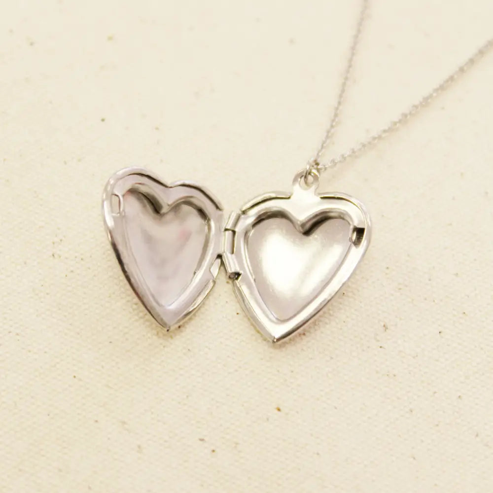 Cousins Collective - Crying Heart Locket Charm Necklace Silver