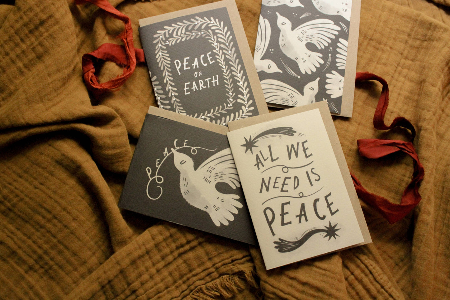 Close-up of the watercolour dove illustration on 'A Dove for Peace' Christmas card