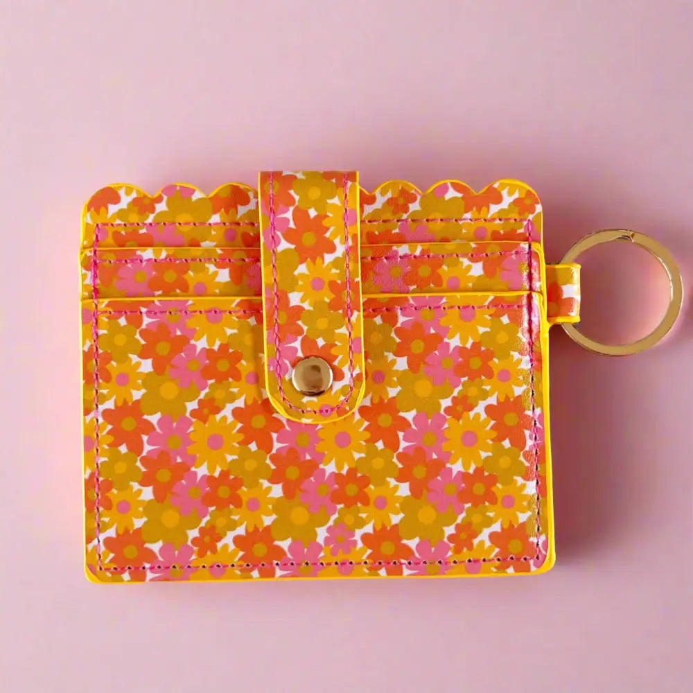 Retro floral wallet in pink, orange, and yellow with scalloped edges, snap closure, and gold keyring - PABOOM