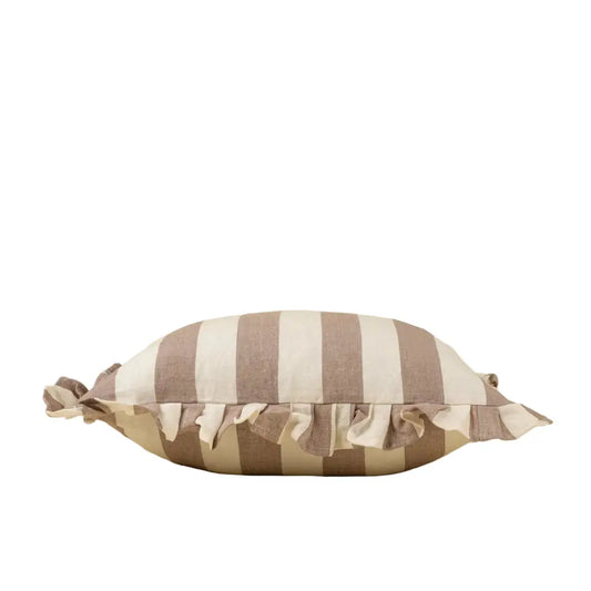 Striped pillow with ruffles on a beige background