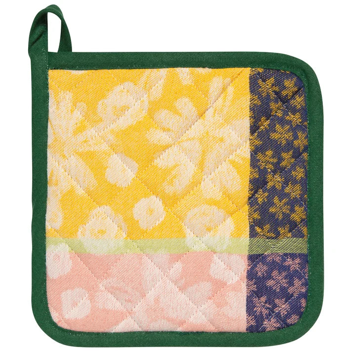 Full Bloom potholder styled hanging in a kitchen β PABOOM