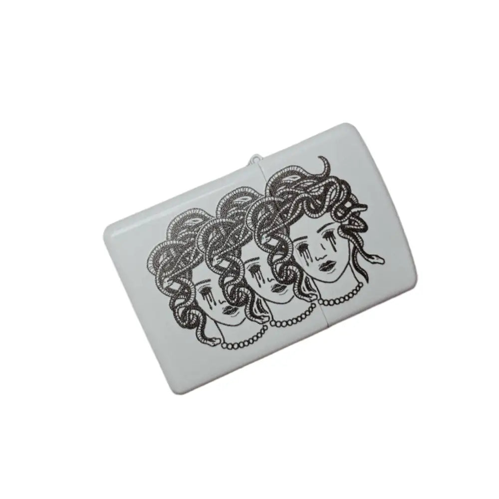 Zippo White lighter with 3 heads of medusa head with snakes and bleeding eyes