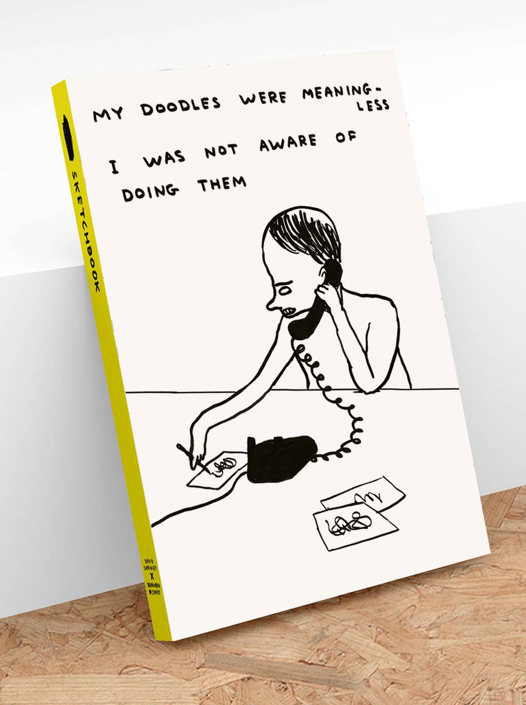 David Shrigley line drawing of a figure on the phone absent-mindedly doodling, captioned "My doodles were meaningless, I was not aware of doing them," on a sketchbook cover - PABOOM