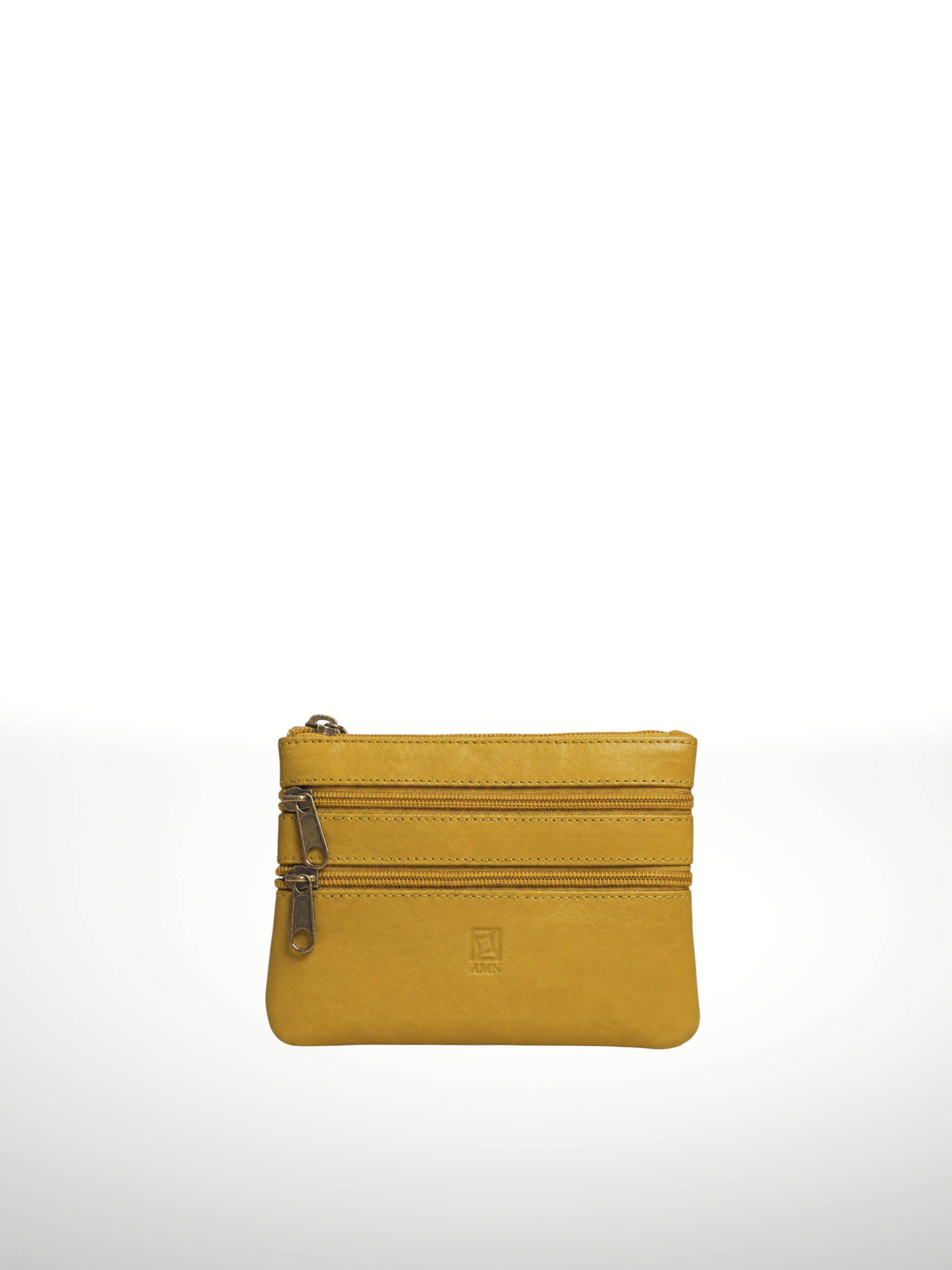 Titan Leather Wallet in Mustard — compact three-zip leather pouch with embossed logo tab, shown flat on white background