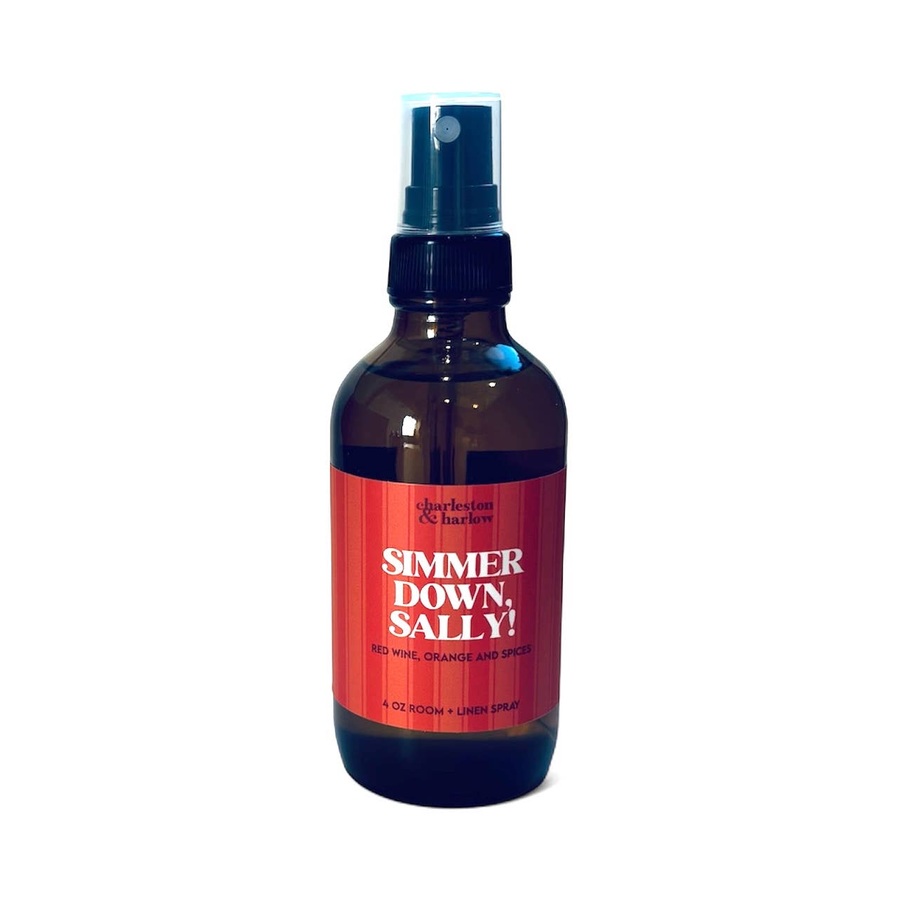 Amber glass spray bottle of Charleston & Harlow Simmer Down, Sally! room and linen spray with red striped label