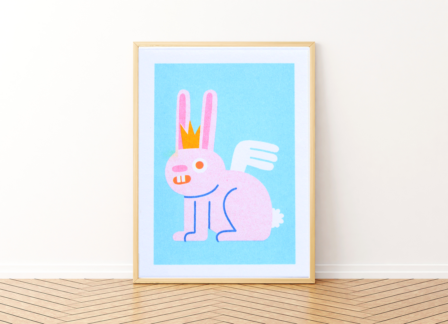 Mini Bunny Risograph Print — illustration of a pink bunny wearing a crown and wings, shown framed against a blue background