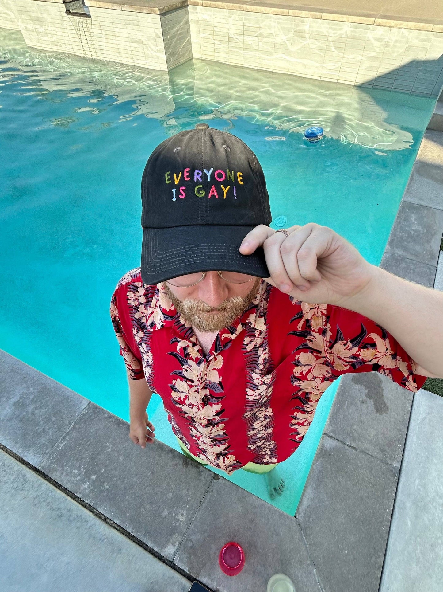 Close-up of the Everyone Is Gay hat's embroidered lettering