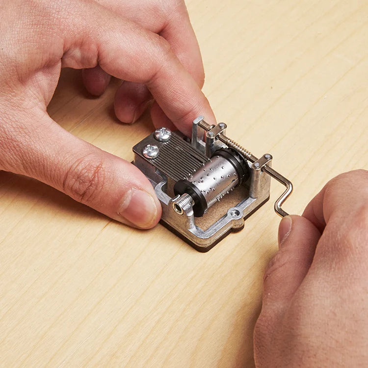 You Are My Sunshine music box shown closed with crank folded.