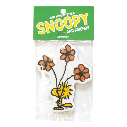 Woodstock-shaped air freshener with three orange flower blooms, packaged on a green 'Snoopy and Friends Summer' header card.
