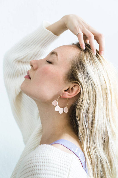 Blush pink leather petal hoop earrings on Whitebirch earring card