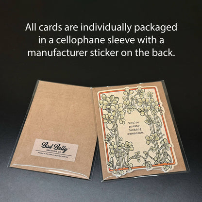 Go Forth and Make Shit Happen card packaged in a cellophane sleeve