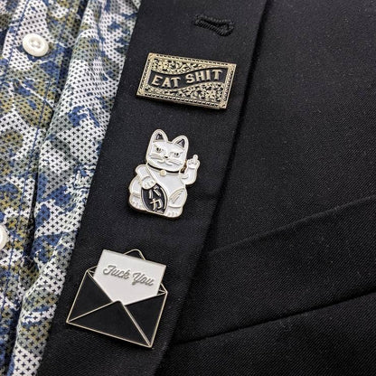 Angled view of Fuck You envelope pin - PABOOM