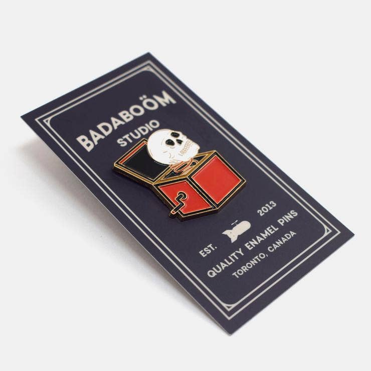 Angled view of Skullbox Pin showing dimensional design - PABOOM