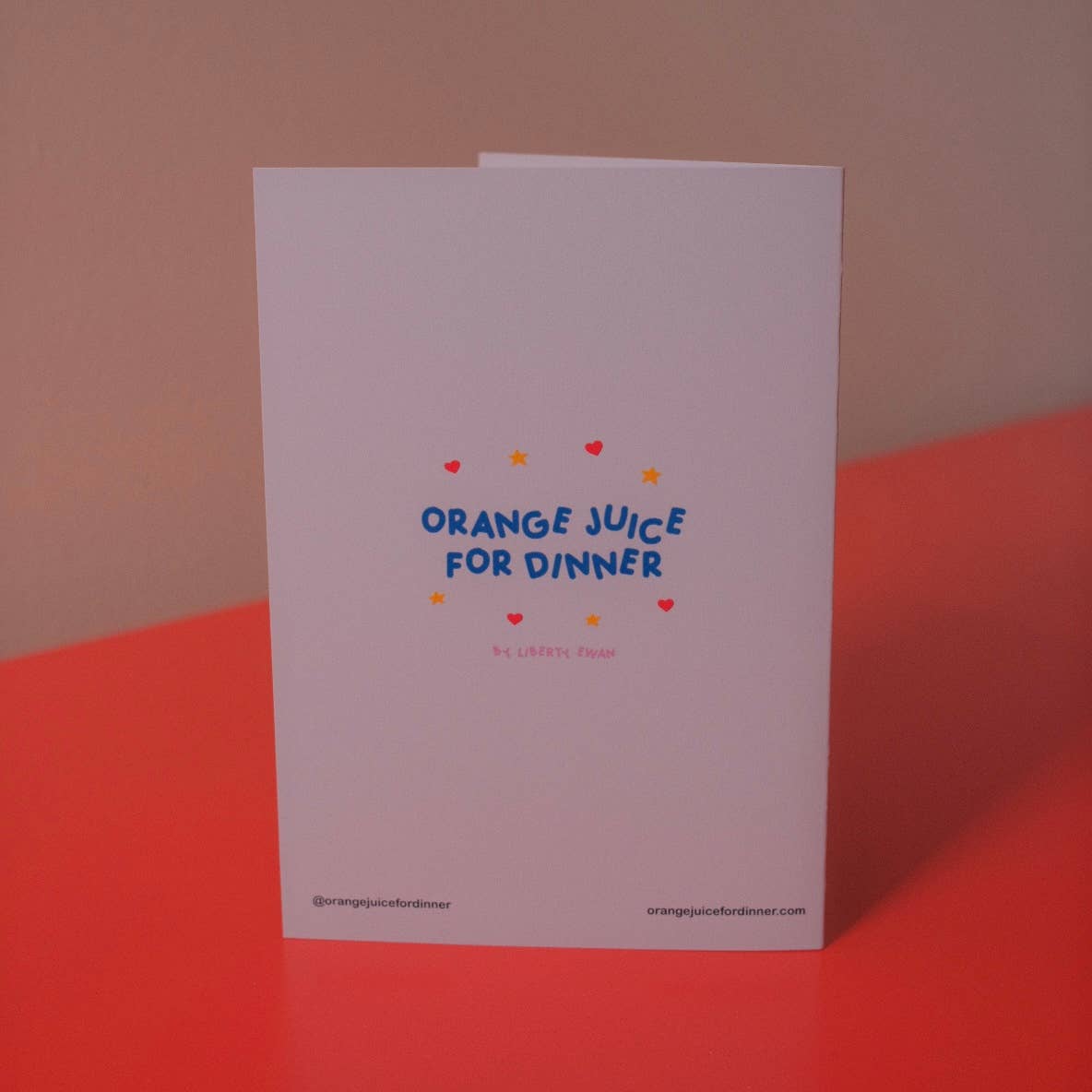Congratulations card shown at an angle with kraft envelope - PABOOM