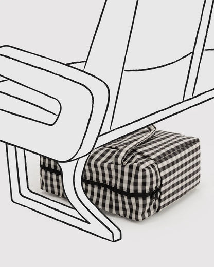 Close-up of the tech pocket and side pockets on the BAGGU Small Cloud Carry-On in black and cream gingham