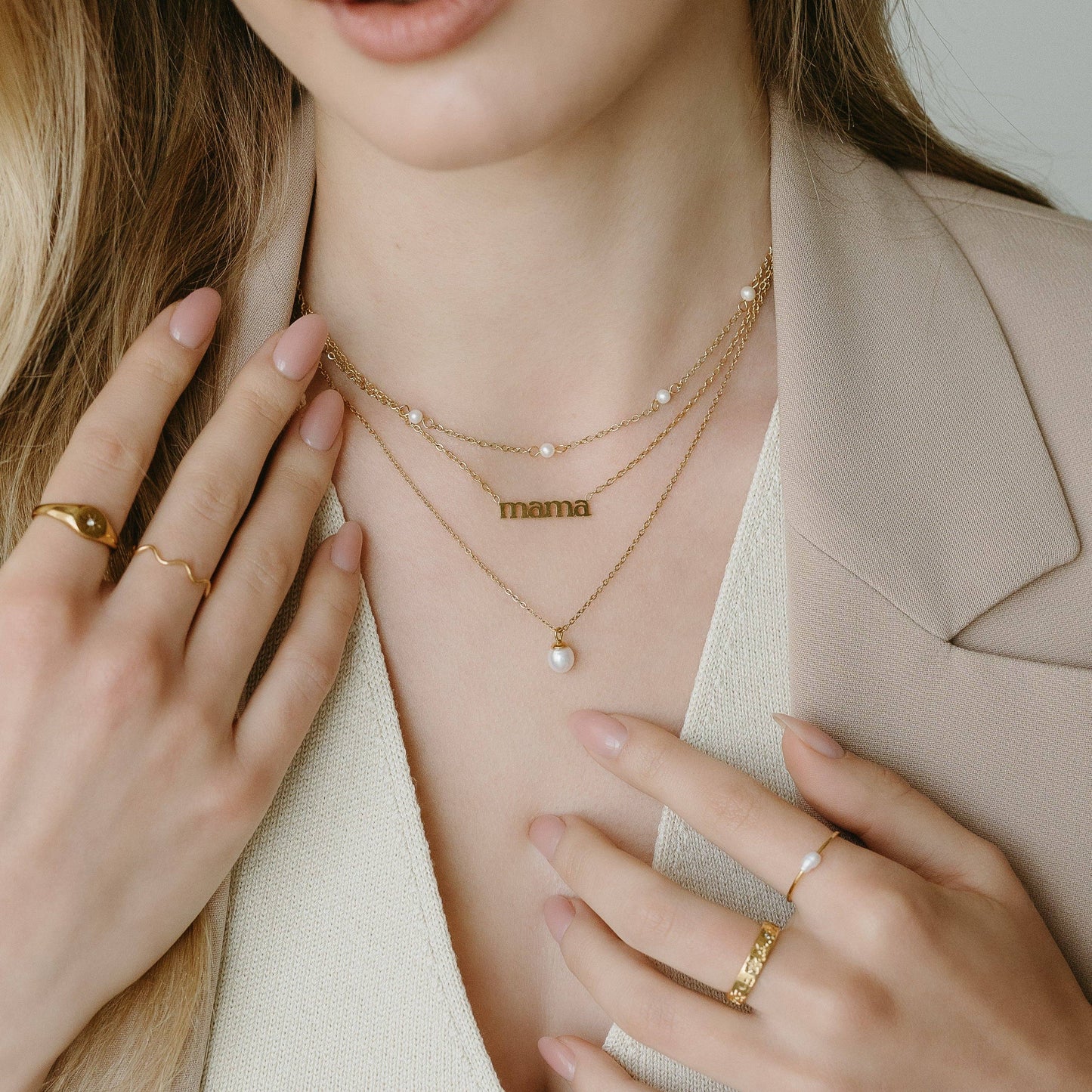 Pearl pendant gold necklace styled on a neck - PABOOM