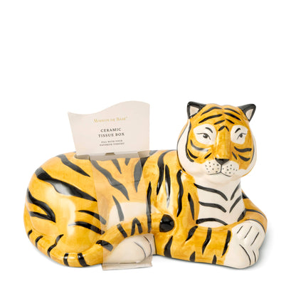 Orange and white ceramic Tiger Tissue Box shaped like a reclining tiger with a tissue peeking out of its back