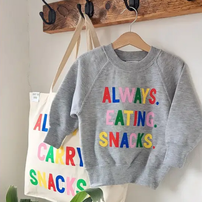 Always Eating Snacks Sweatshirt