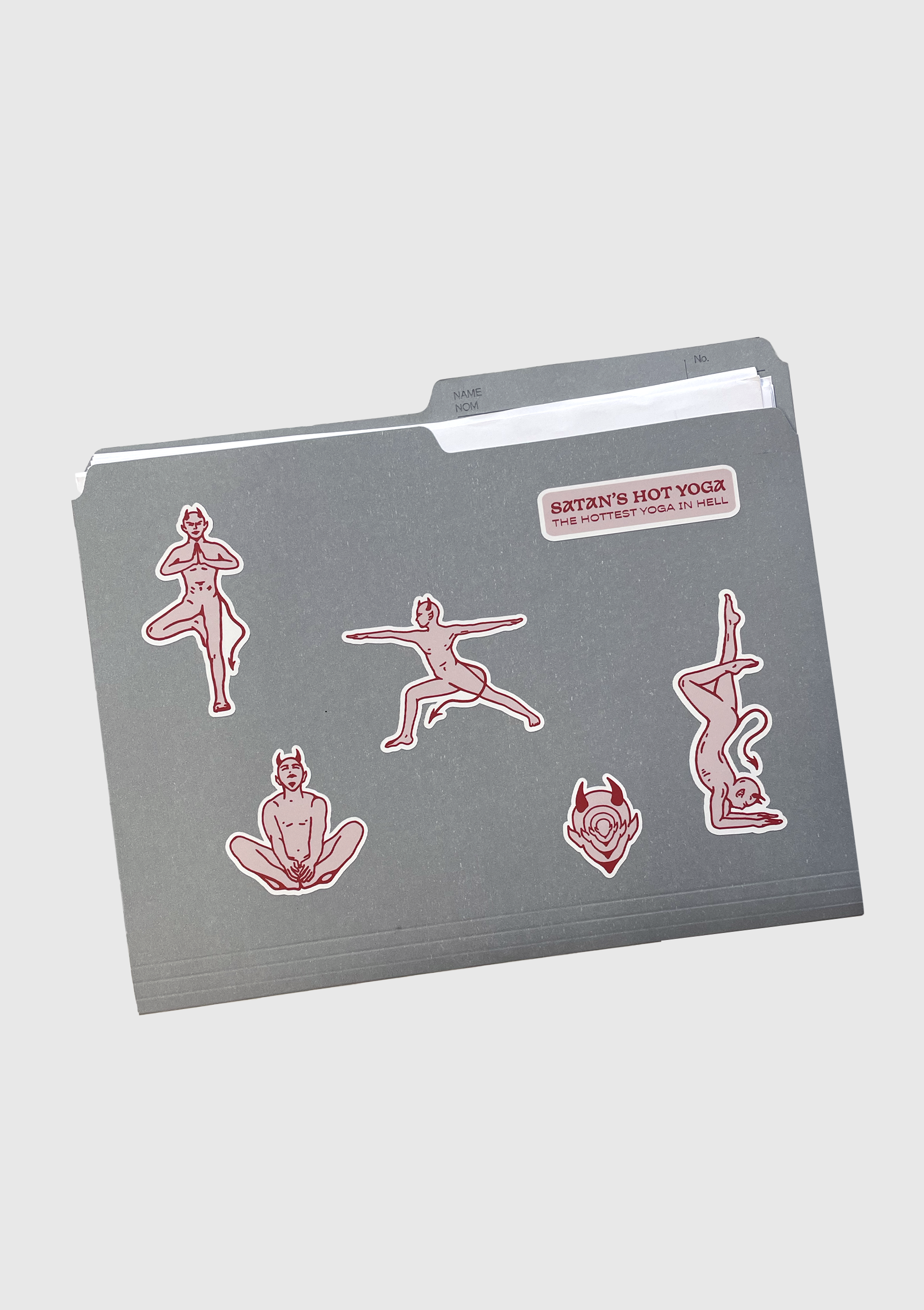 Close-up of devil pose sticker designs on Satan's Hot Yoga sheet - PABOOM