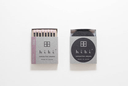 Hibi Ylang Ylang incense matches in a pale lilac box, open to show matchsticks beside a closed box - PABOOM