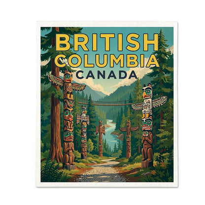 Reusable dishcloth printed with a British Columbia forest scene featuring totem poles and a river